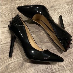 New black patent heels with spikes